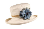ladies cream sun hat with blue anenome flower decoration on side of hat with hessian band round crown of hat