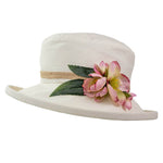 ladies cream hat with japanese pink flower decoration on side of hat with hessian band round the crown